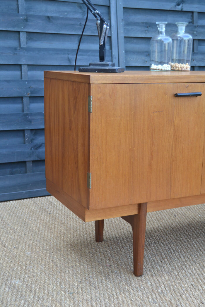 Uniflex-teak-leather sideboard