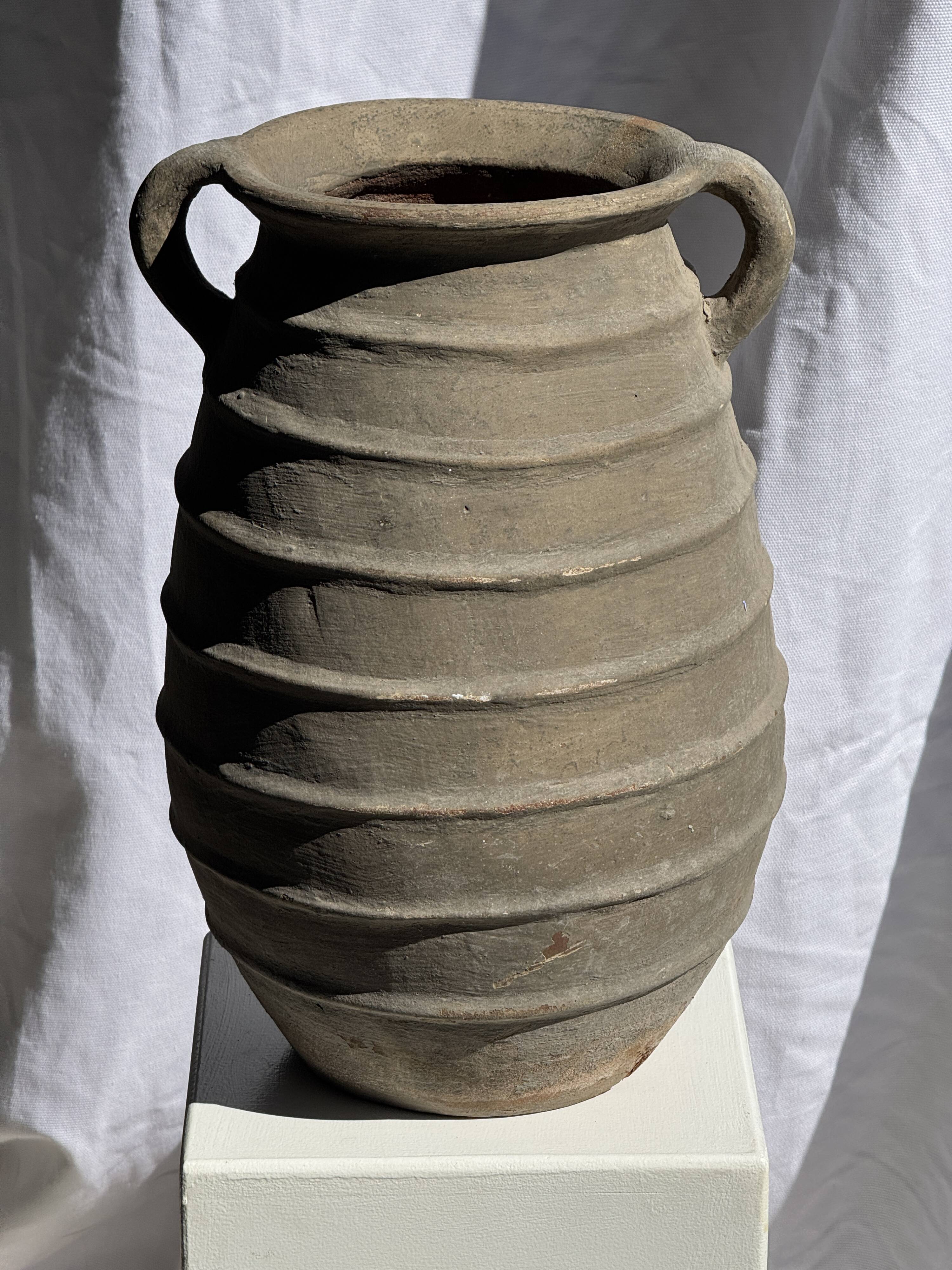 Large oval vase with double handles, featuring raised grey-beige stripes, H42 D28.