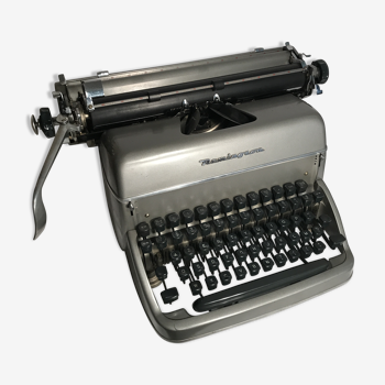 Ancienne machine à écrire Remington en métal gris vintage