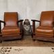 PAIR OF BRUTALIST ARMCHAIRS IN TEAK AND VINTAGE COGNAC LEATHER FROM THE 1950S