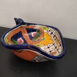 Empty pocket with floral patterns in the shape of a leaf