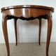 Flying table in Louis XV style with floral marquetry and bronze fittings.