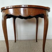 Flying table in Louis XV style with floral marquetry and bronze fittings.
