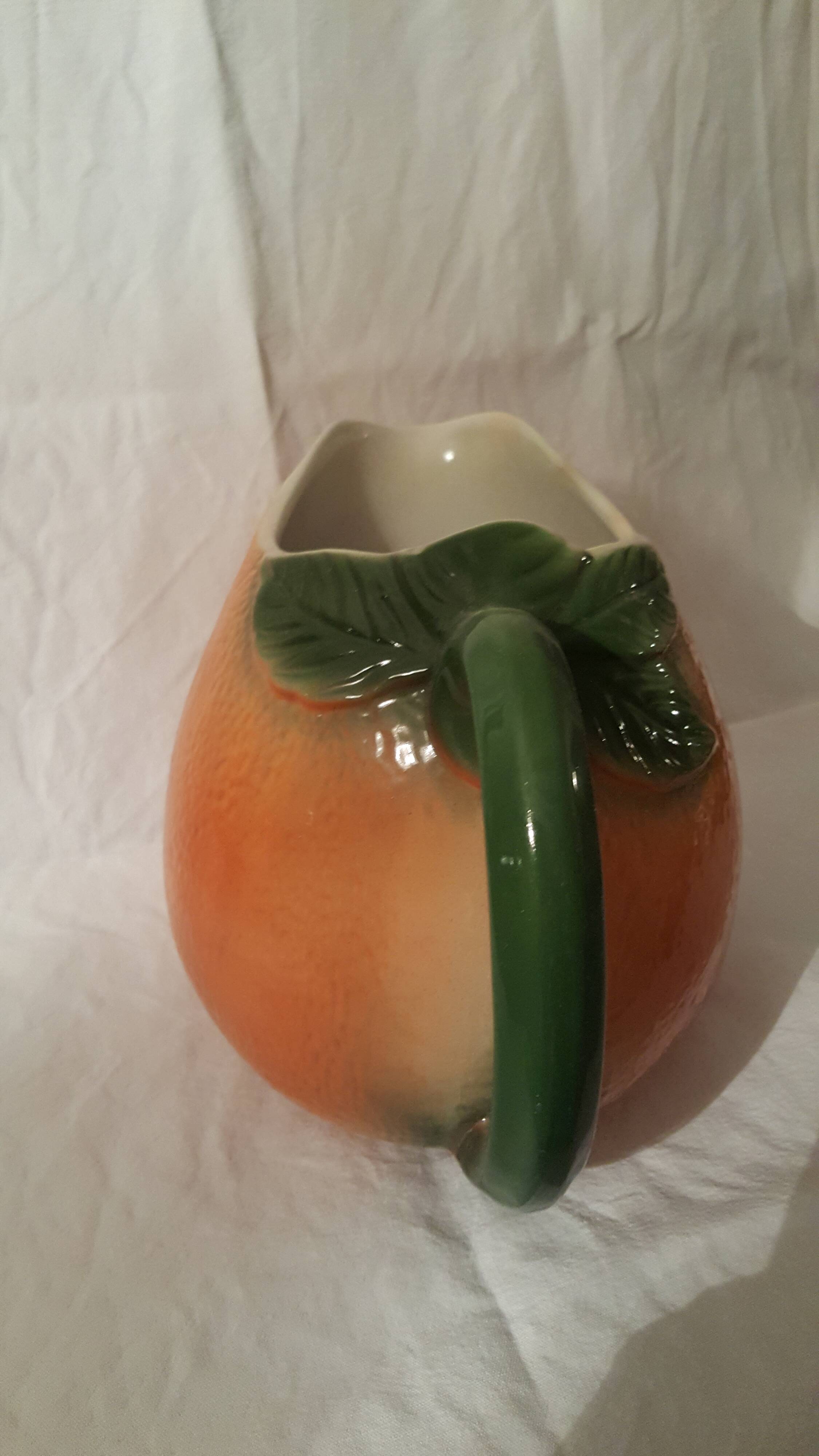 Fruit-shaped pitcher: an orange
