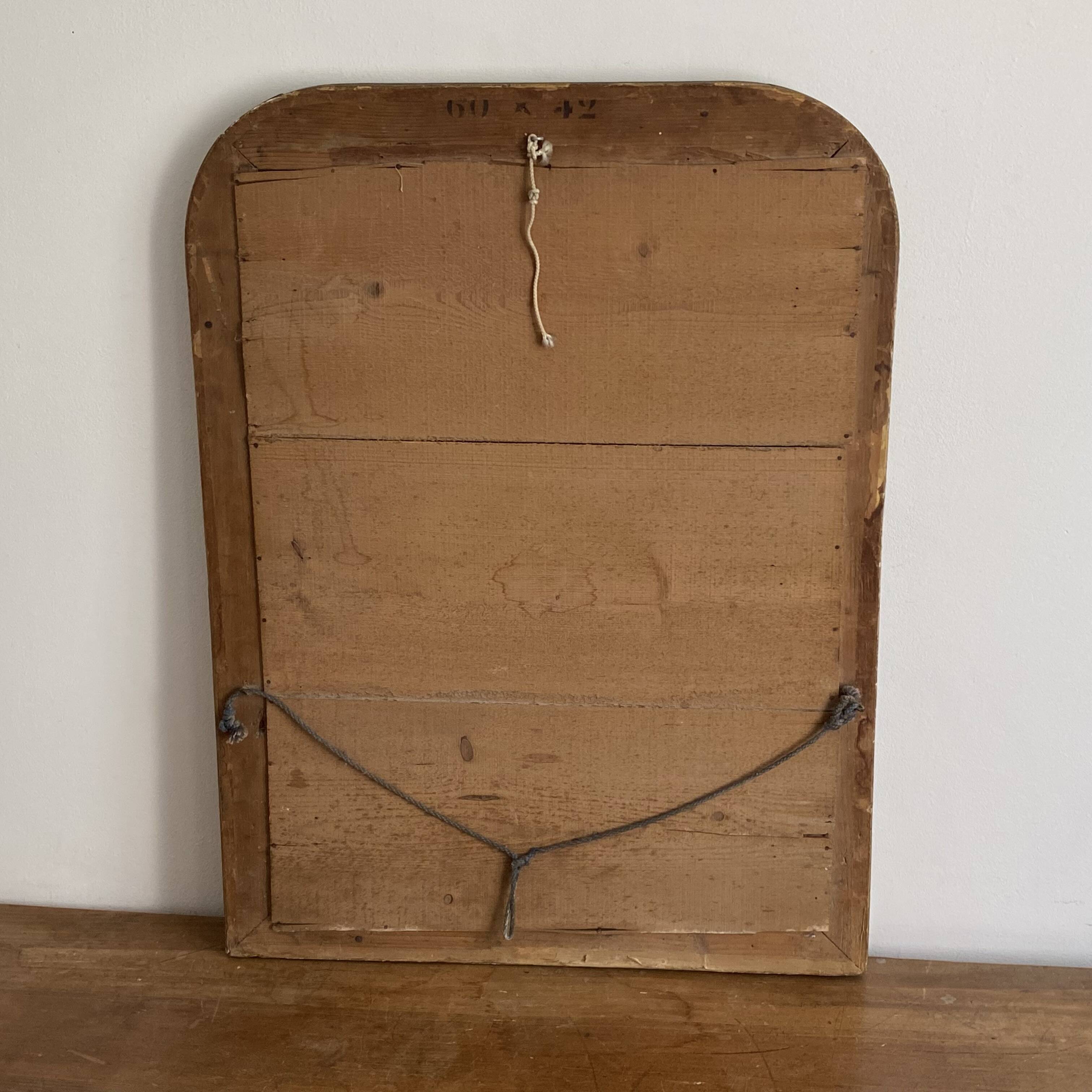 Miroir Louis Philippe fin 19ème. Doré. 75x56.
