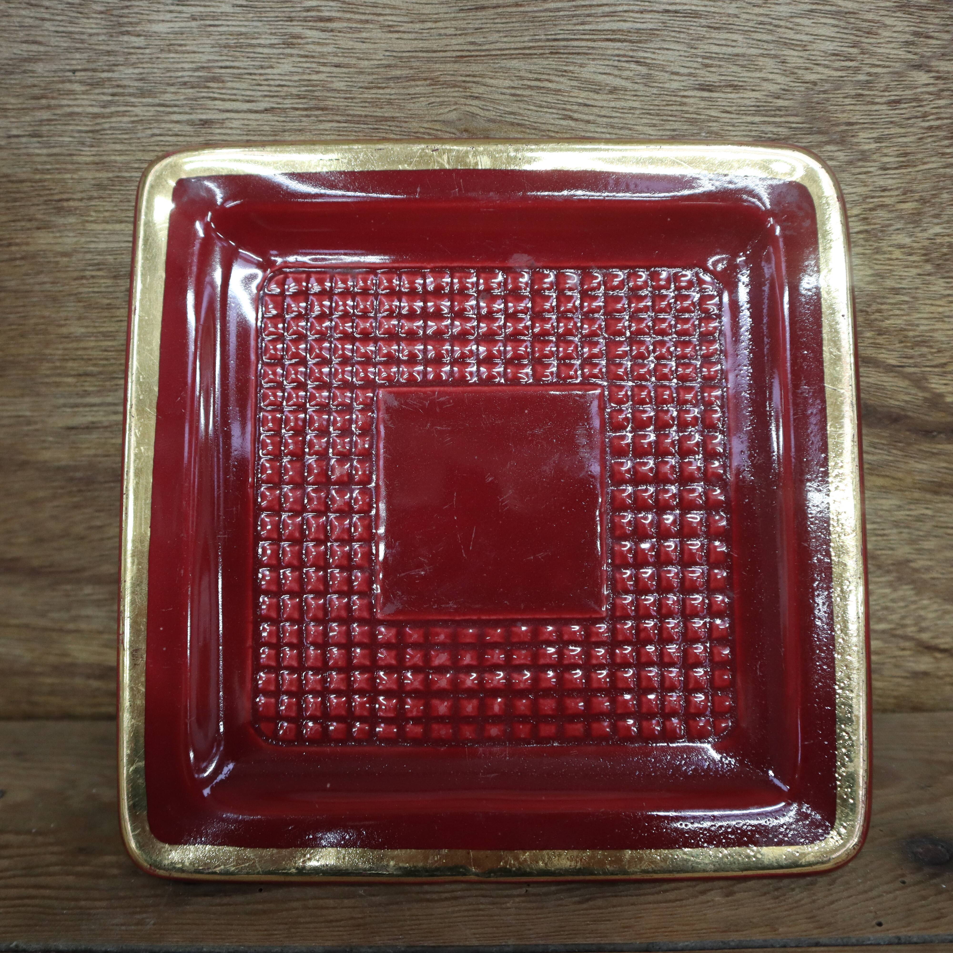 Saint Clément burgundy pocket emptier with gold trim