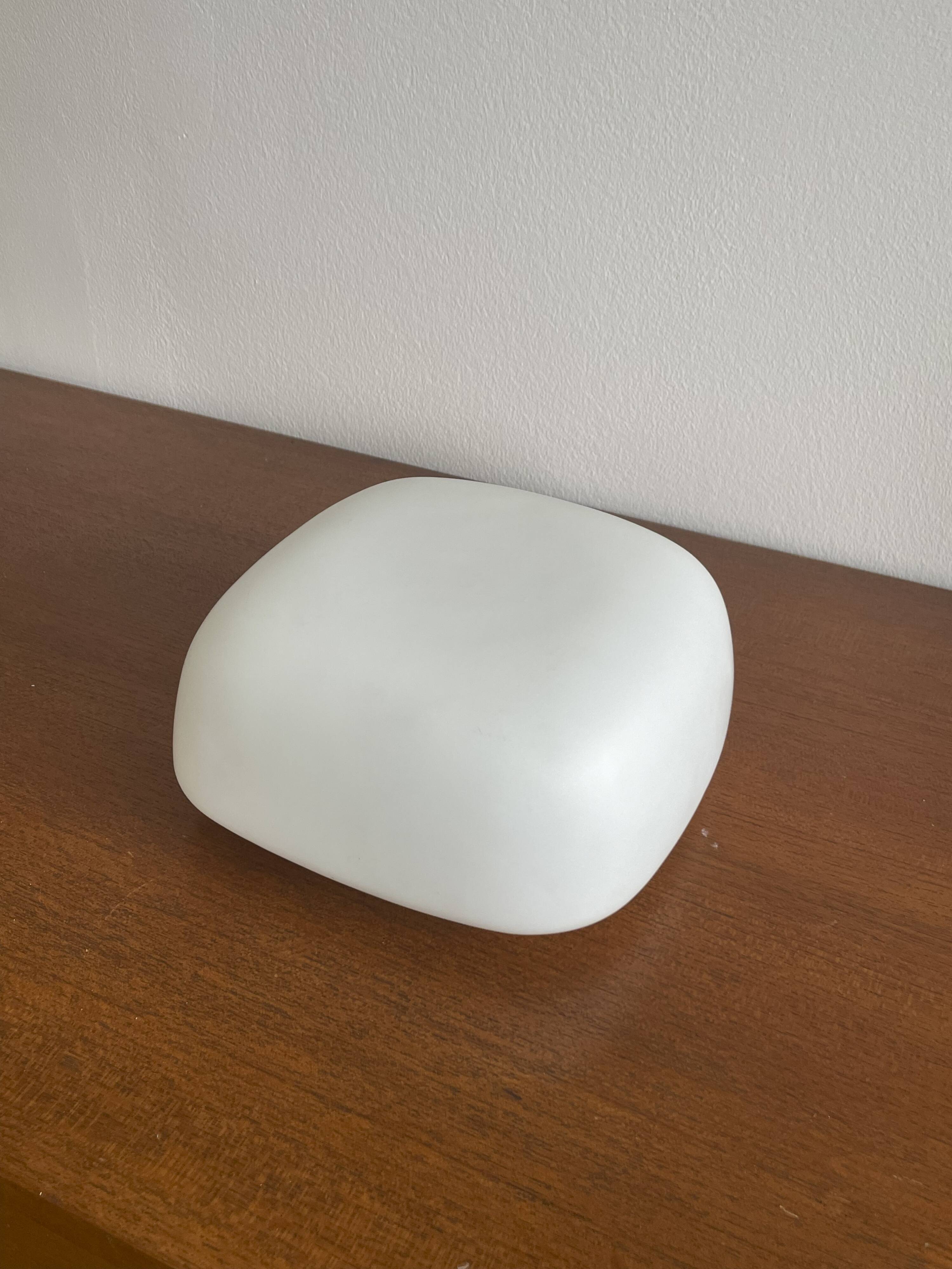 Square wall lights in sandblasted white glass