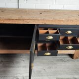 Old workbench furniture with six drawers and a door