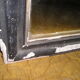 Antique wall mirror in wood and blackened stucco 43x55cm