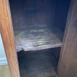 Vintage bedside table in the shape of a wooden column and a gray marble top