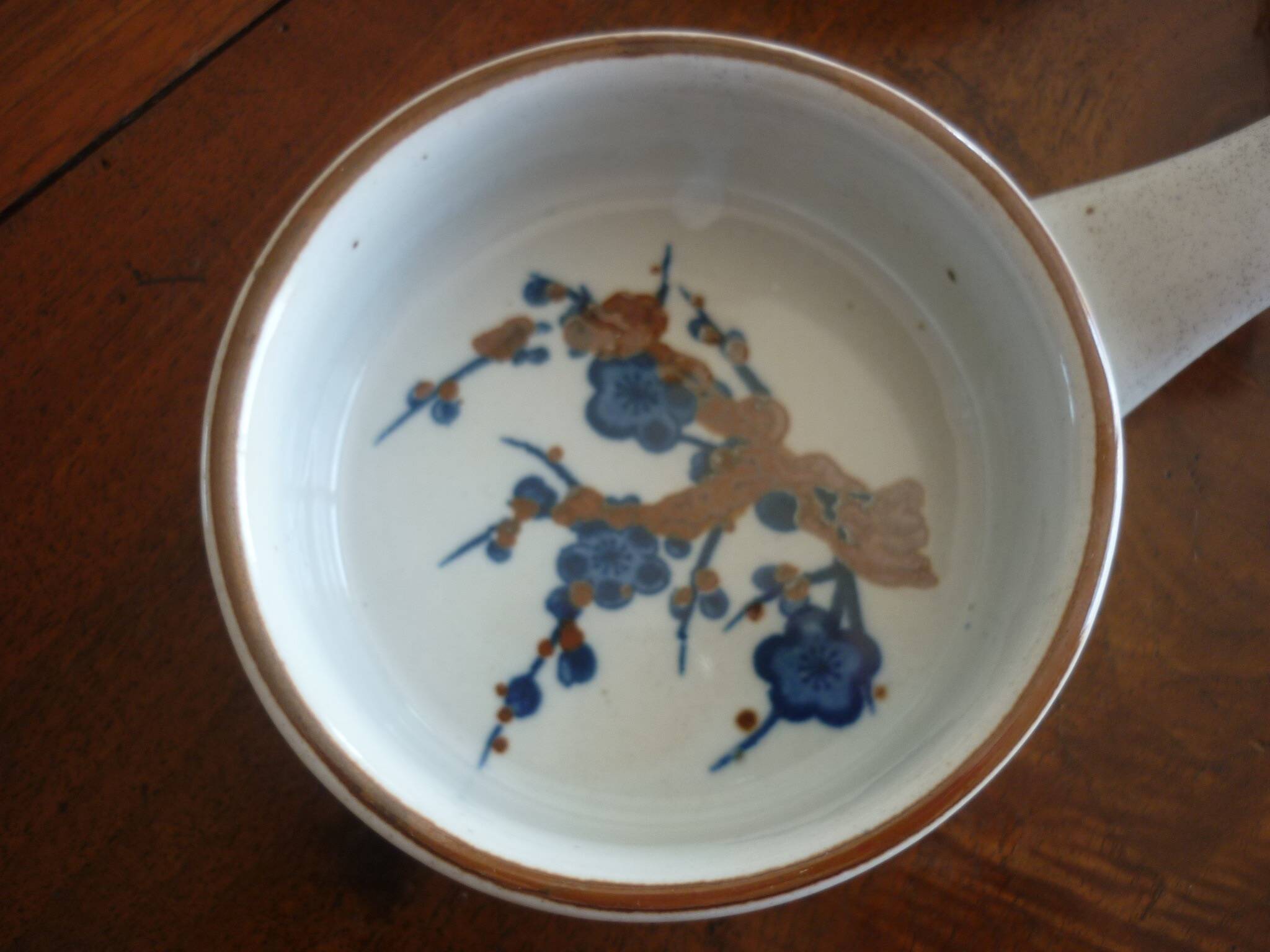 3 ceramic casserole dishes with blue and brown branch pattern