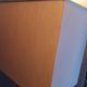Tall cubic brown leather lamp, light gray fabric lampshade