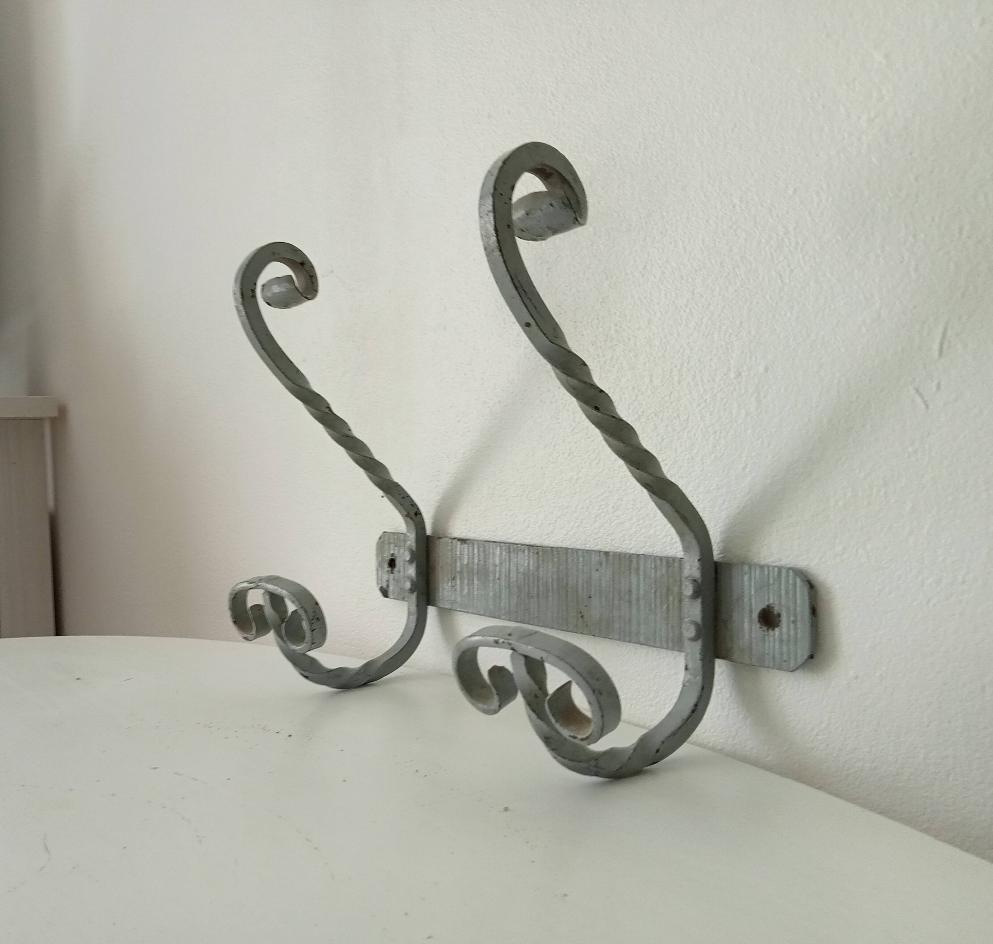 Vintage wrought iron wall coat rack