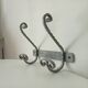 Vintage wrought iron wall coat rack