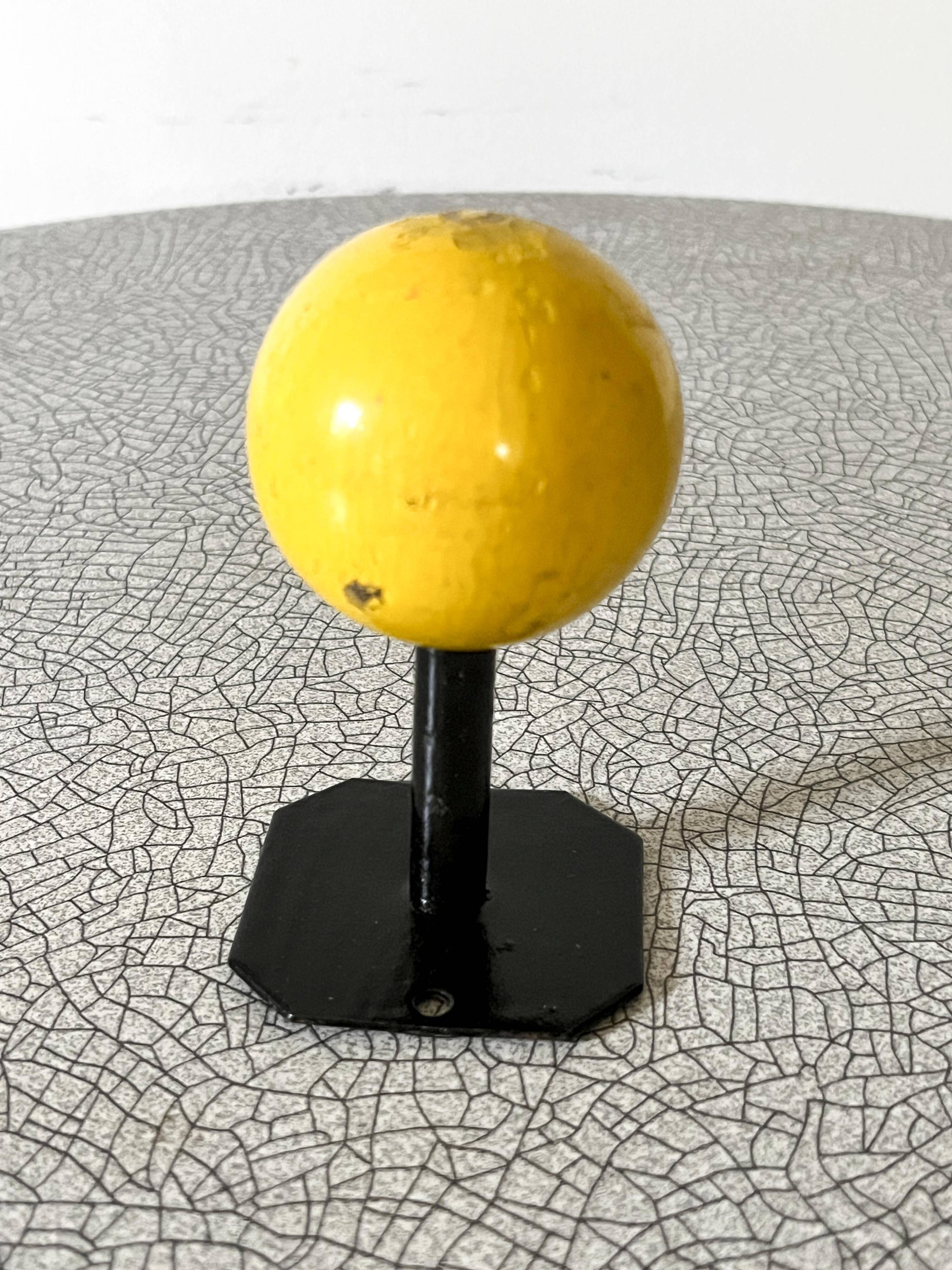 Vintage wall coat rack, metal and wood in yellow, 1 hook.