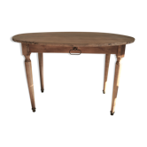 Table ronde en bois brut