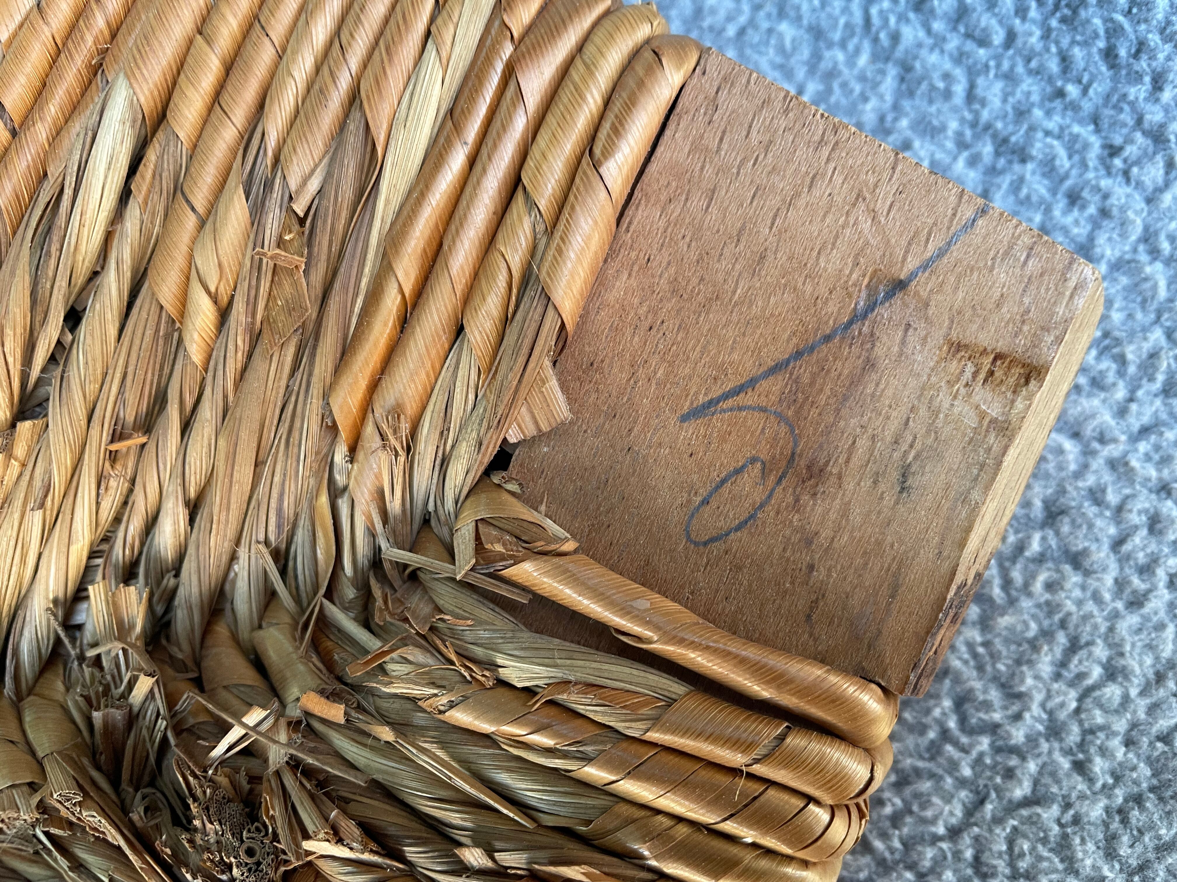 Vintage armchair in straw and brutalist wood