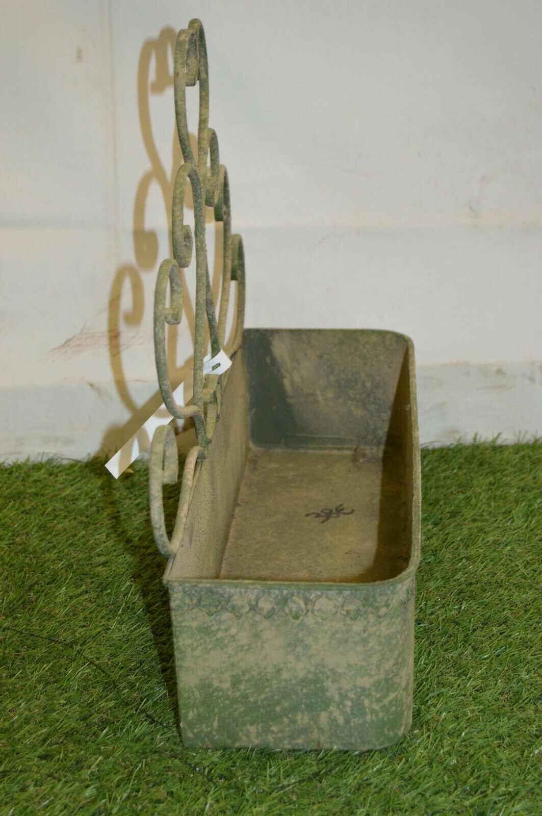 Patinated iron wall planter