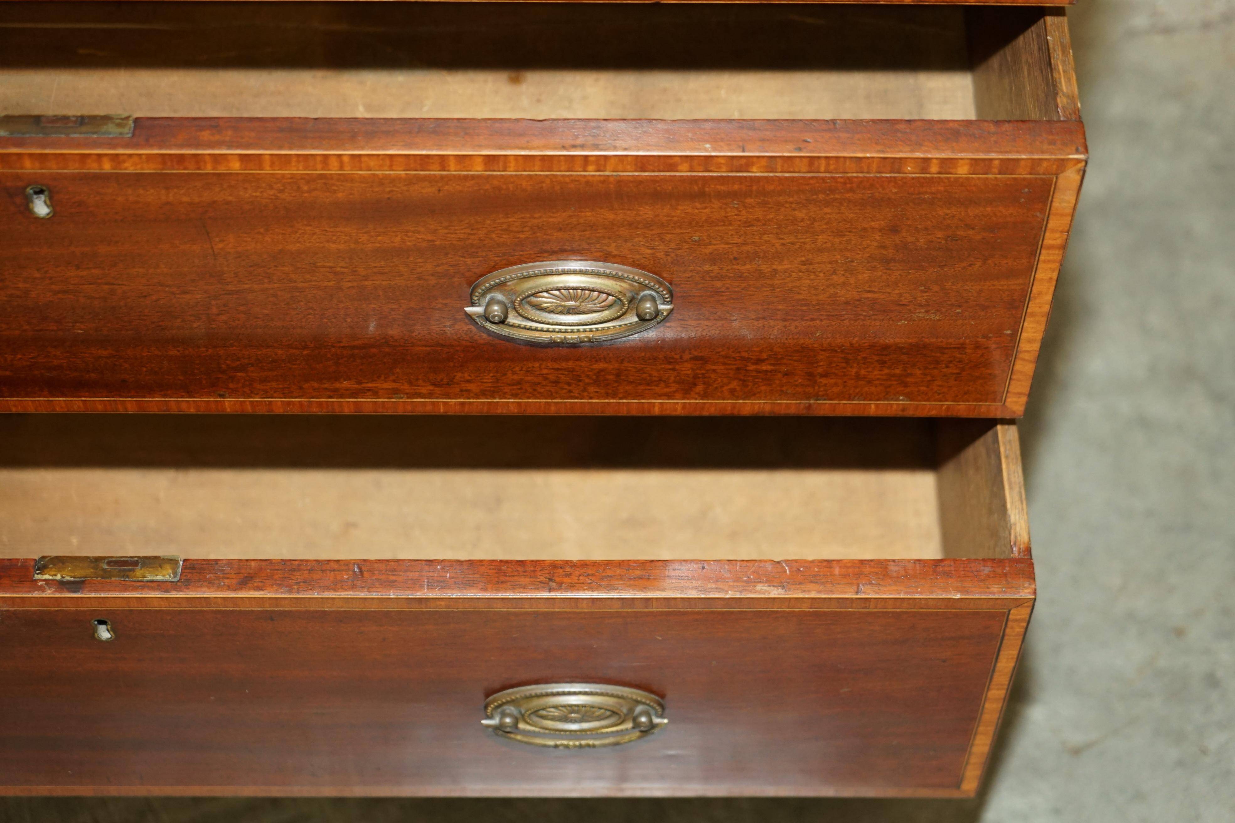 Antique Sheraton style commode by F. Thomas in hardwood and satinwood.