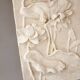 Bajorelief avec des fleurs. Relief avec des fleurs. Fleurs en relief.