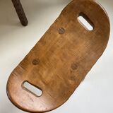 Table and its solid wooden stool of brutalist style popular art