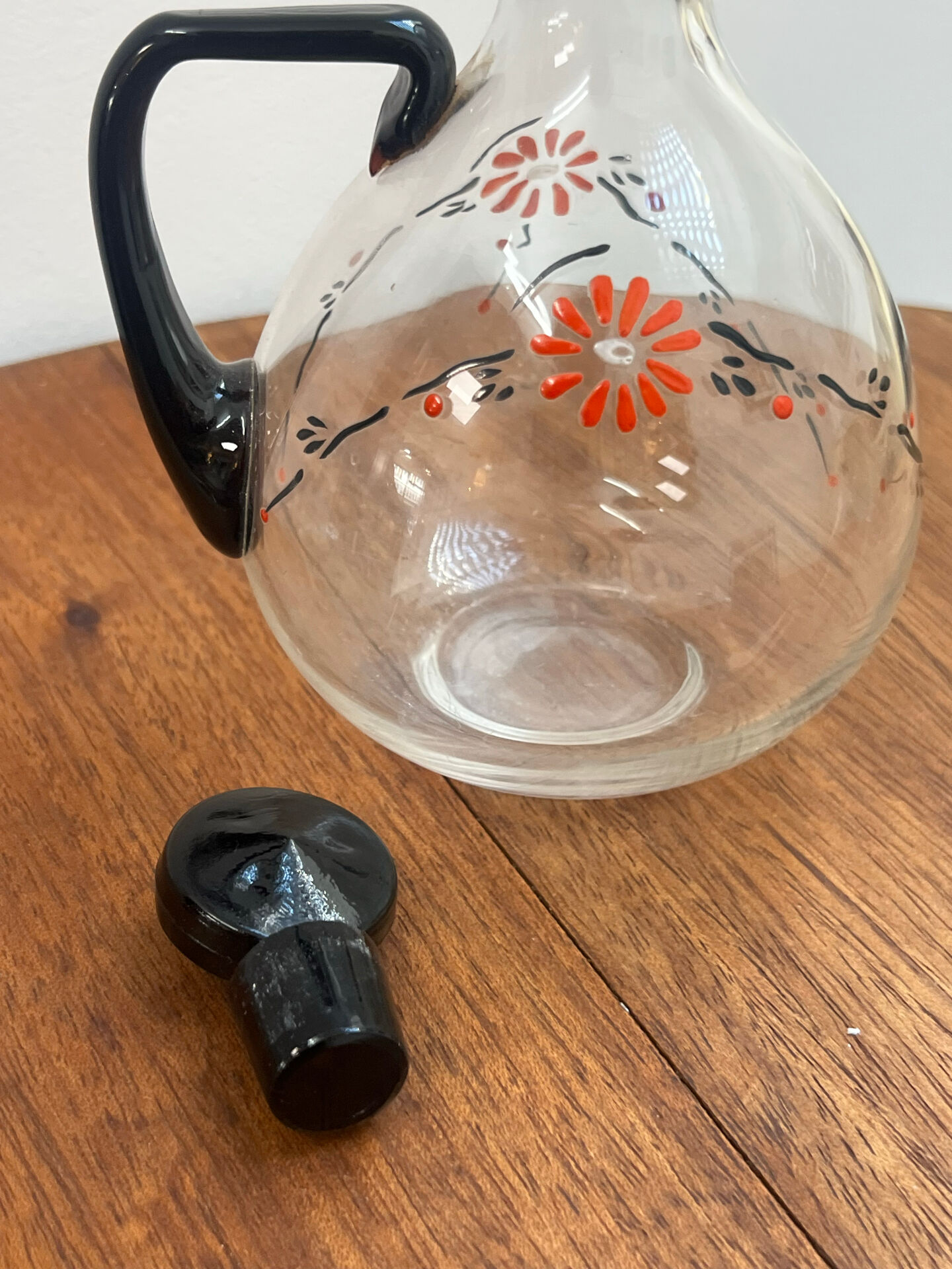 Enamelled glass carafe 1920