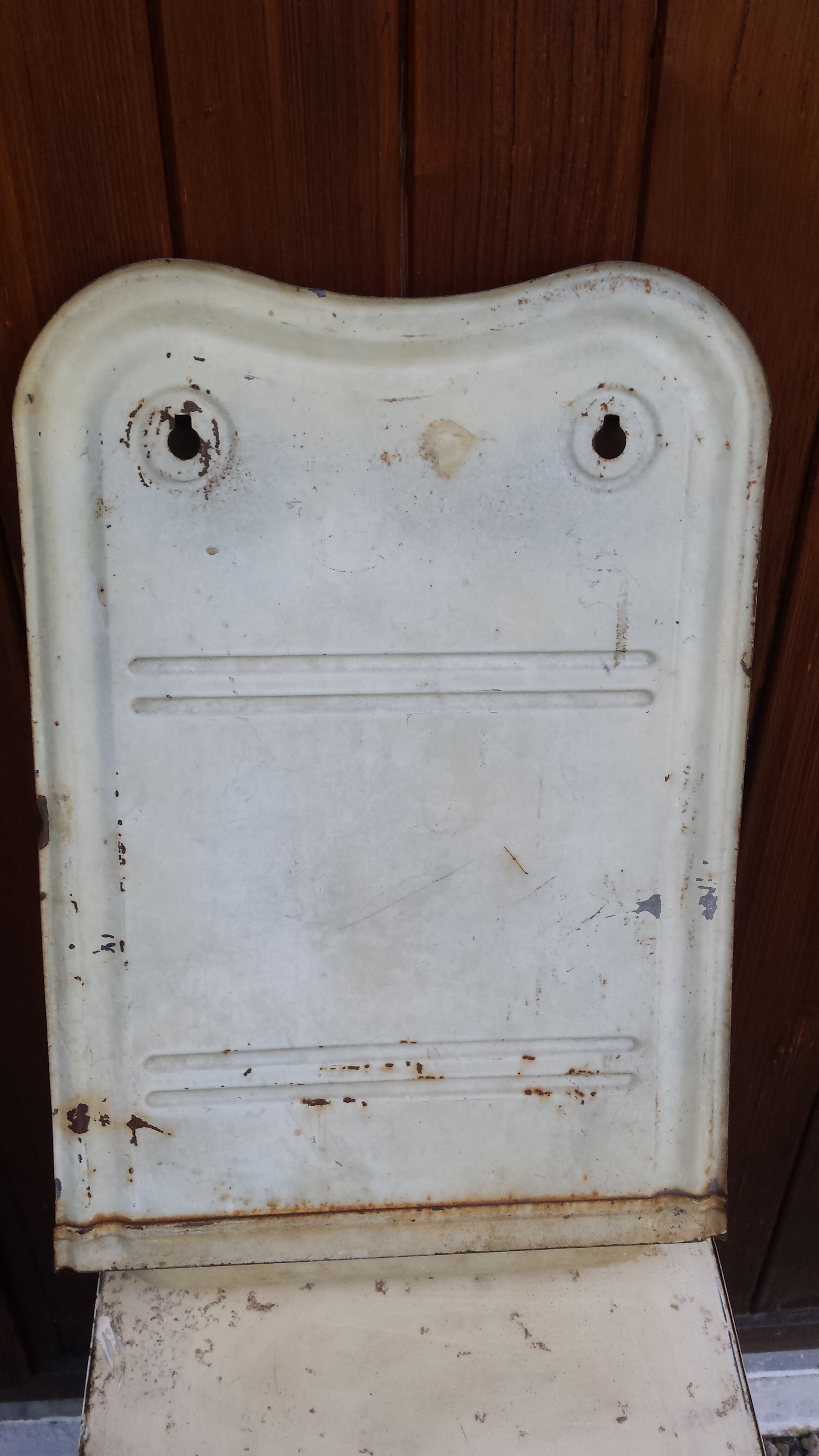 White ladle hangs with bowl