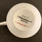 10 cups and 10 saucers in fine porcelain bernardaud cie, limoges for christofle, model eridan