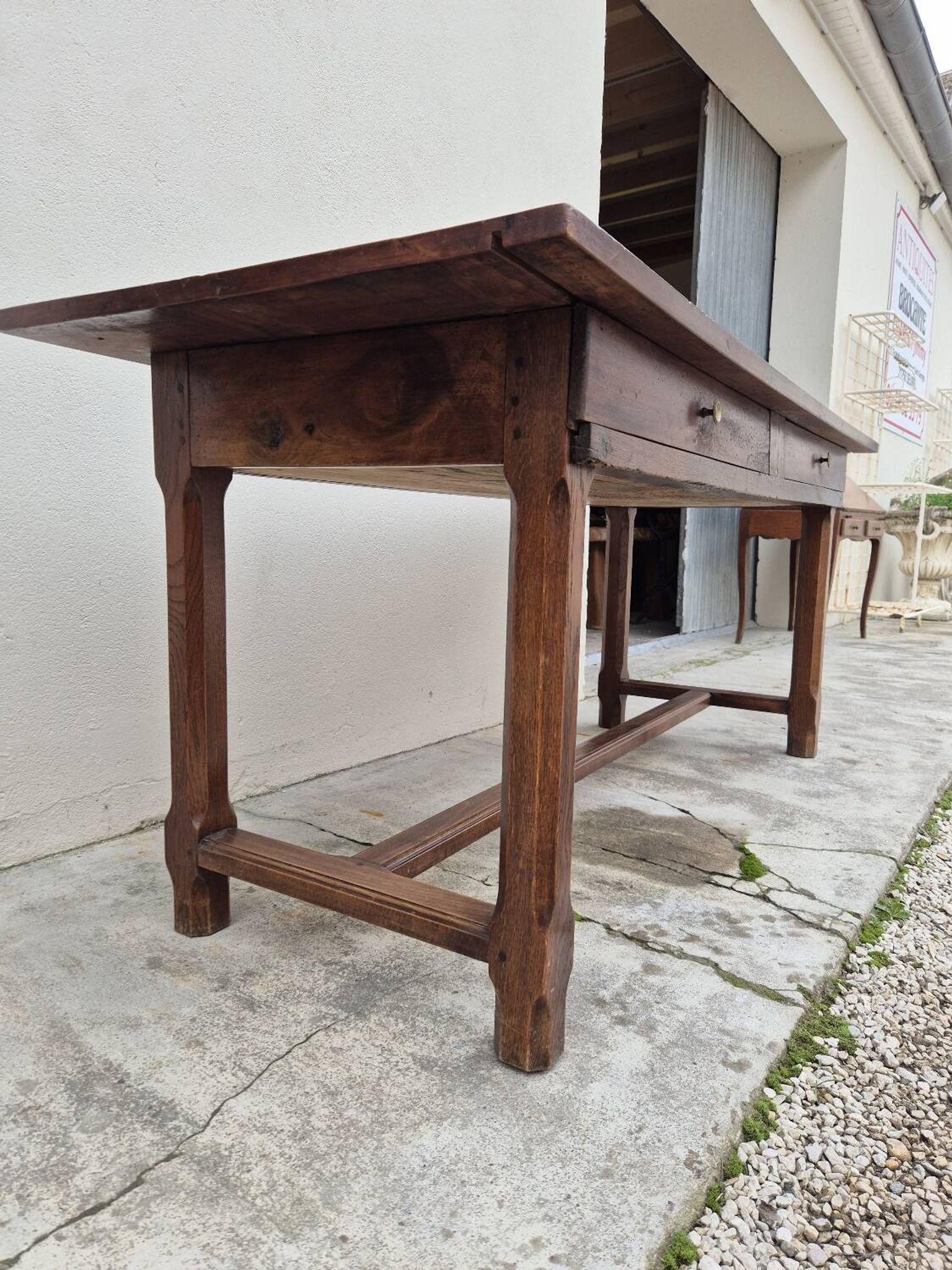 Table de Ferme bourguignonne à entretoise en noyer massif 19éme deux tiroirs-1m82