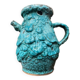 Strange ancient turquoise pitcher