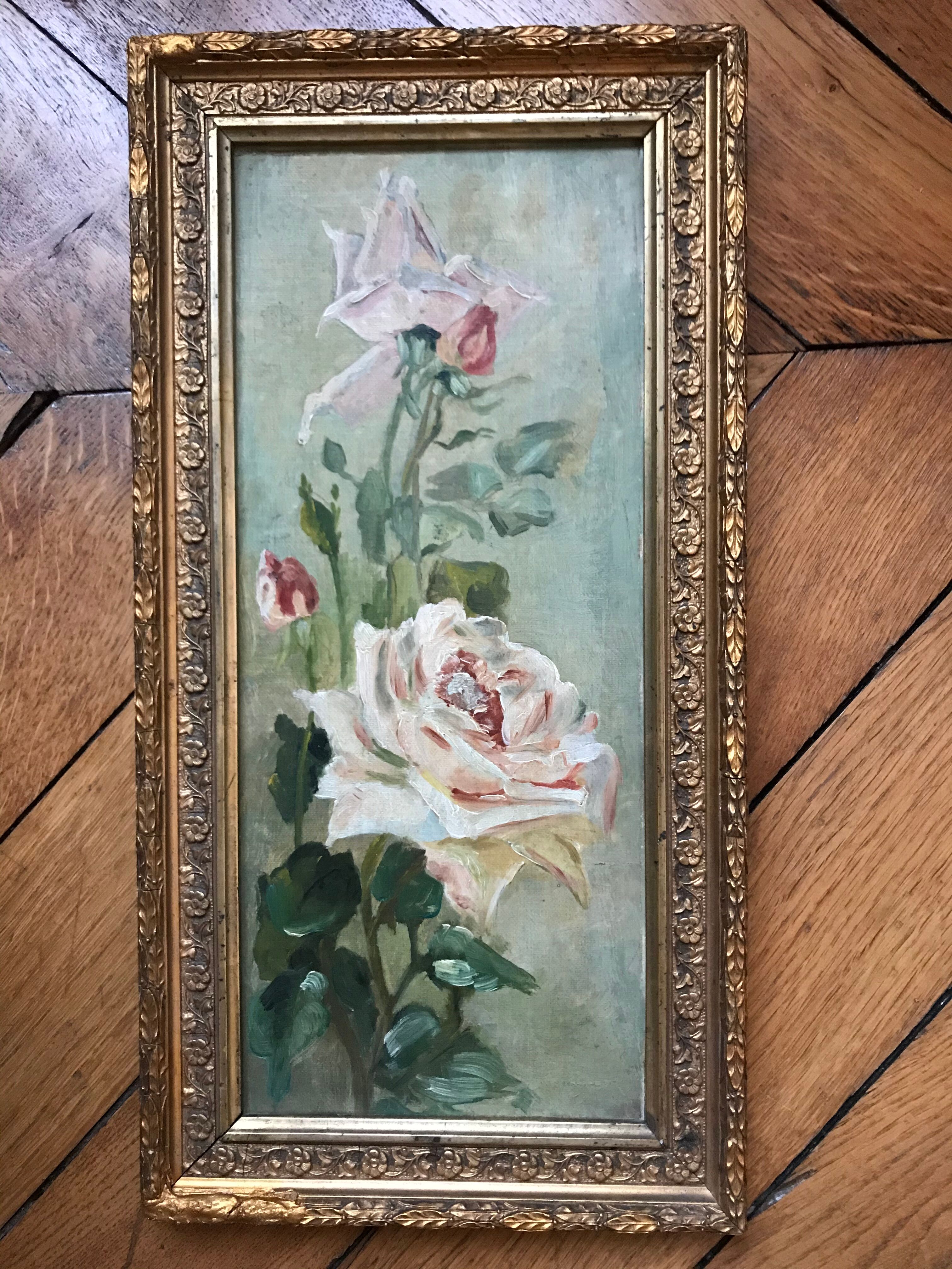 Two old paintings of flowers and gilded frames