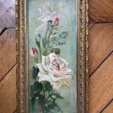 Two old paintings of flowers and gilded frames