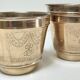 Three pot covers brass silver cover golden patina monogram early twentieth century