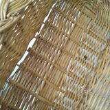 Oval wicker basket with braided edges