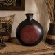 Decorative vase in carved gilded wood