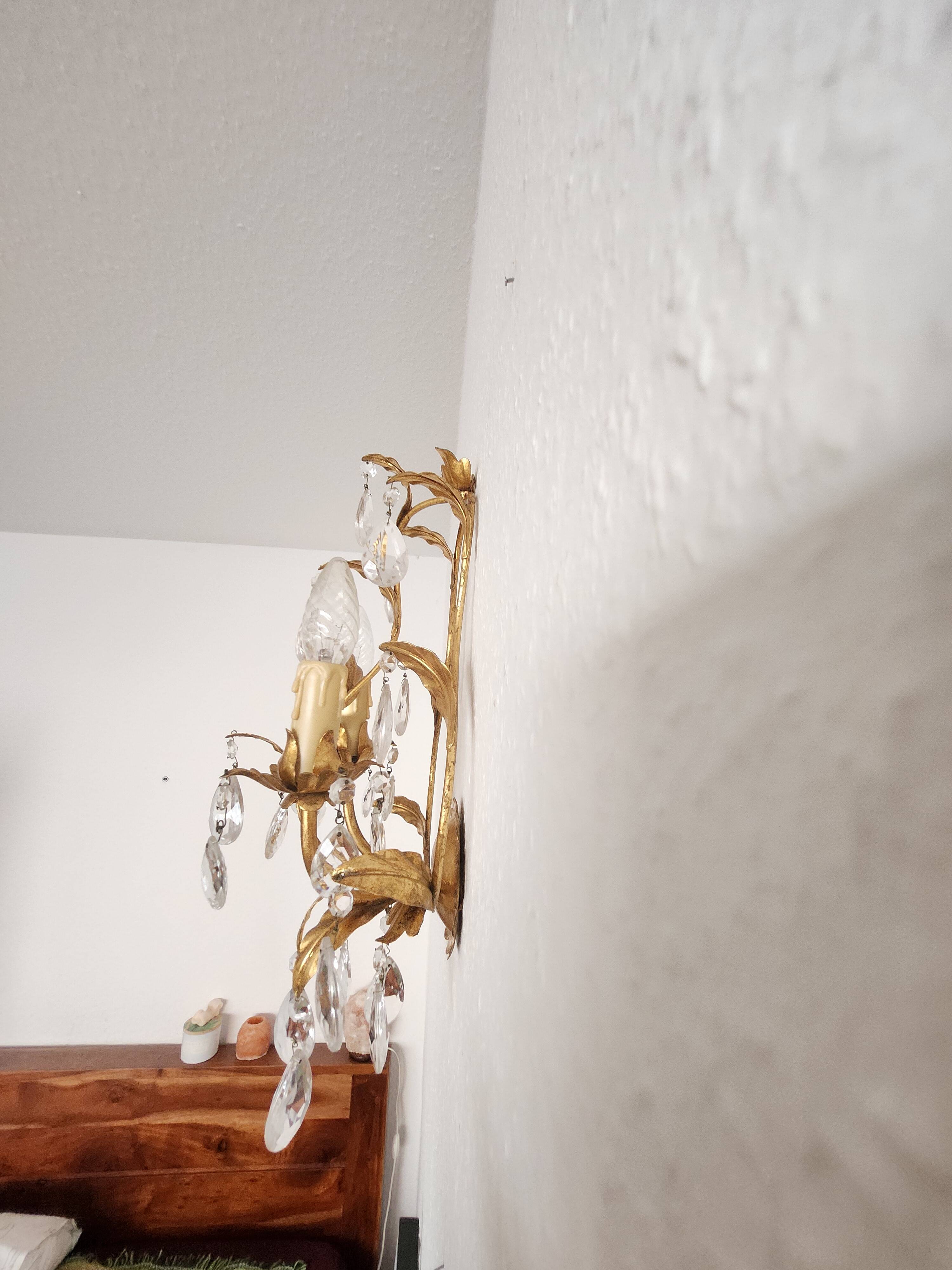 Hand-forged wall lamp gilded with gold leaf and crystals, Italy