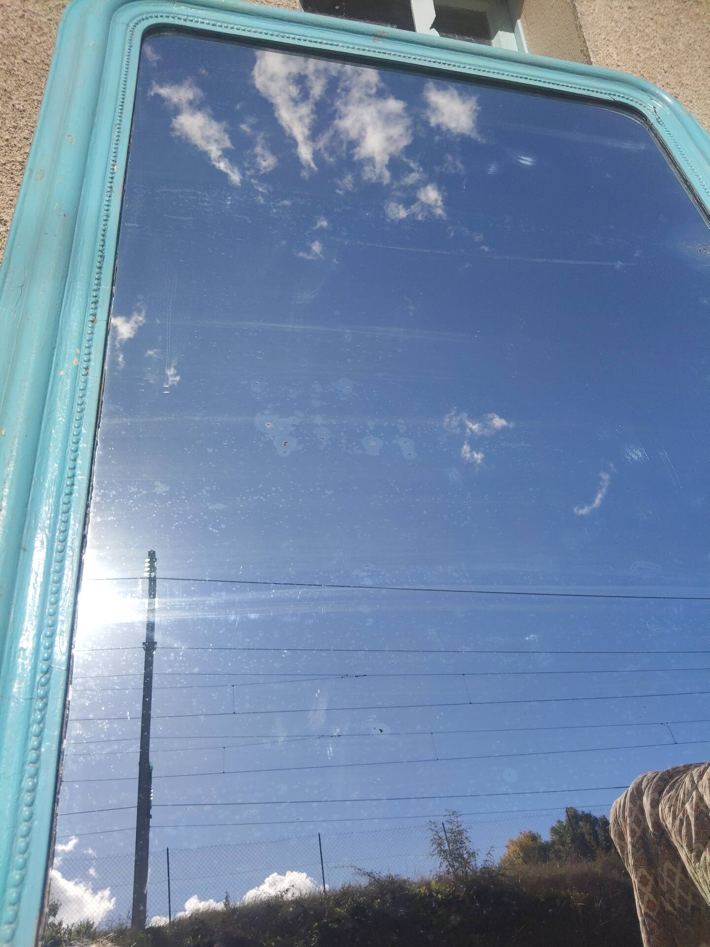 Large Louis-Philippe mirror from the 19th century in wood and stucco with a turquoise blue patina.