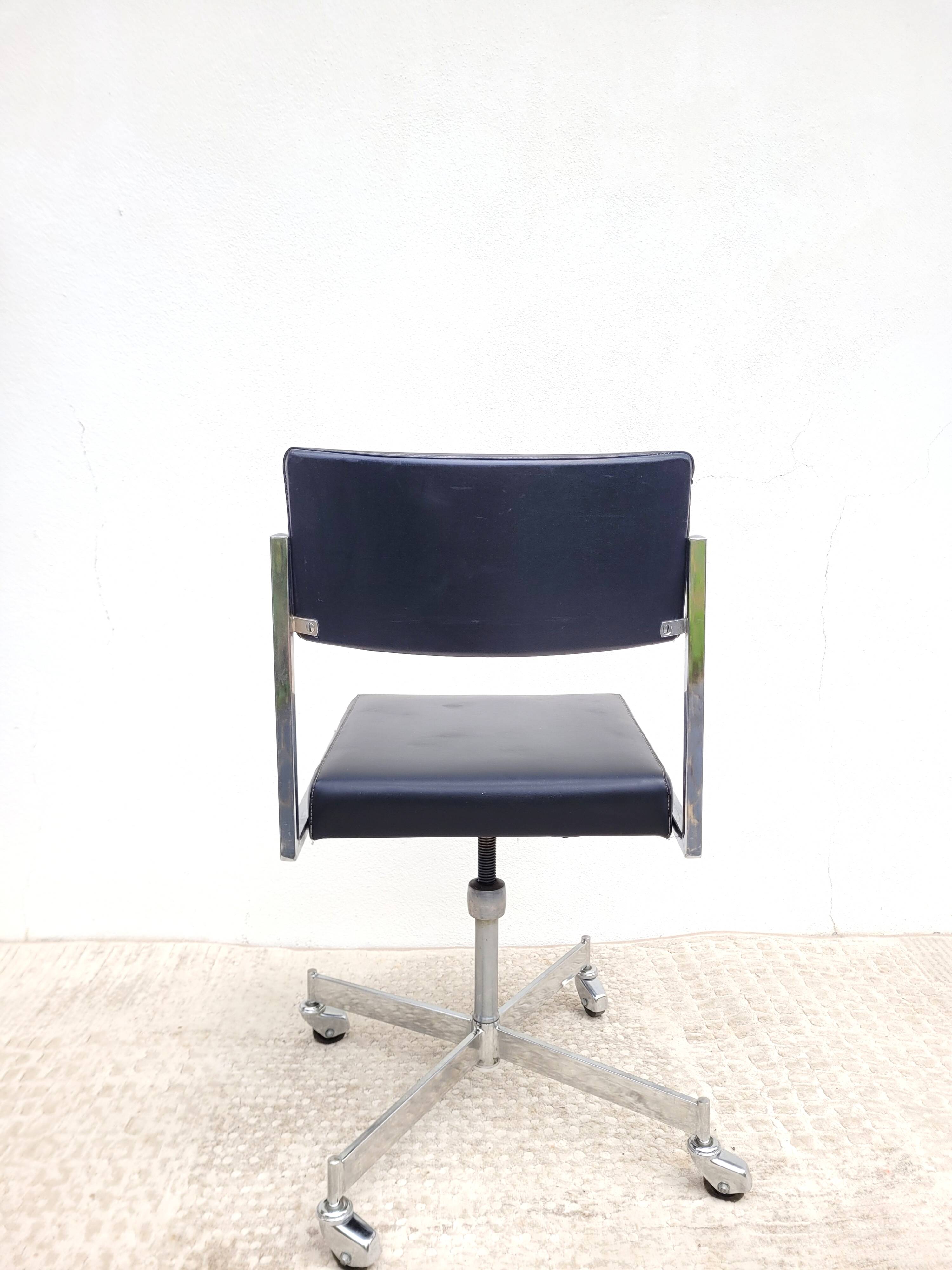 Vintage swivel office chair with casters