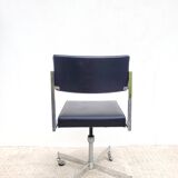 Vintage swivel office chair with casters