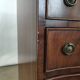 Commode galbée acajou 5 tiroirs poignée anneaux