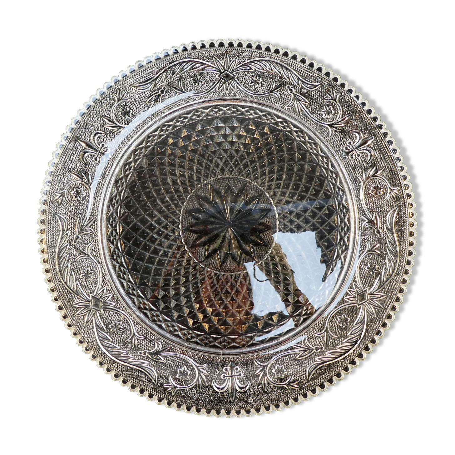 Old plate with pressed glass arabesque pie