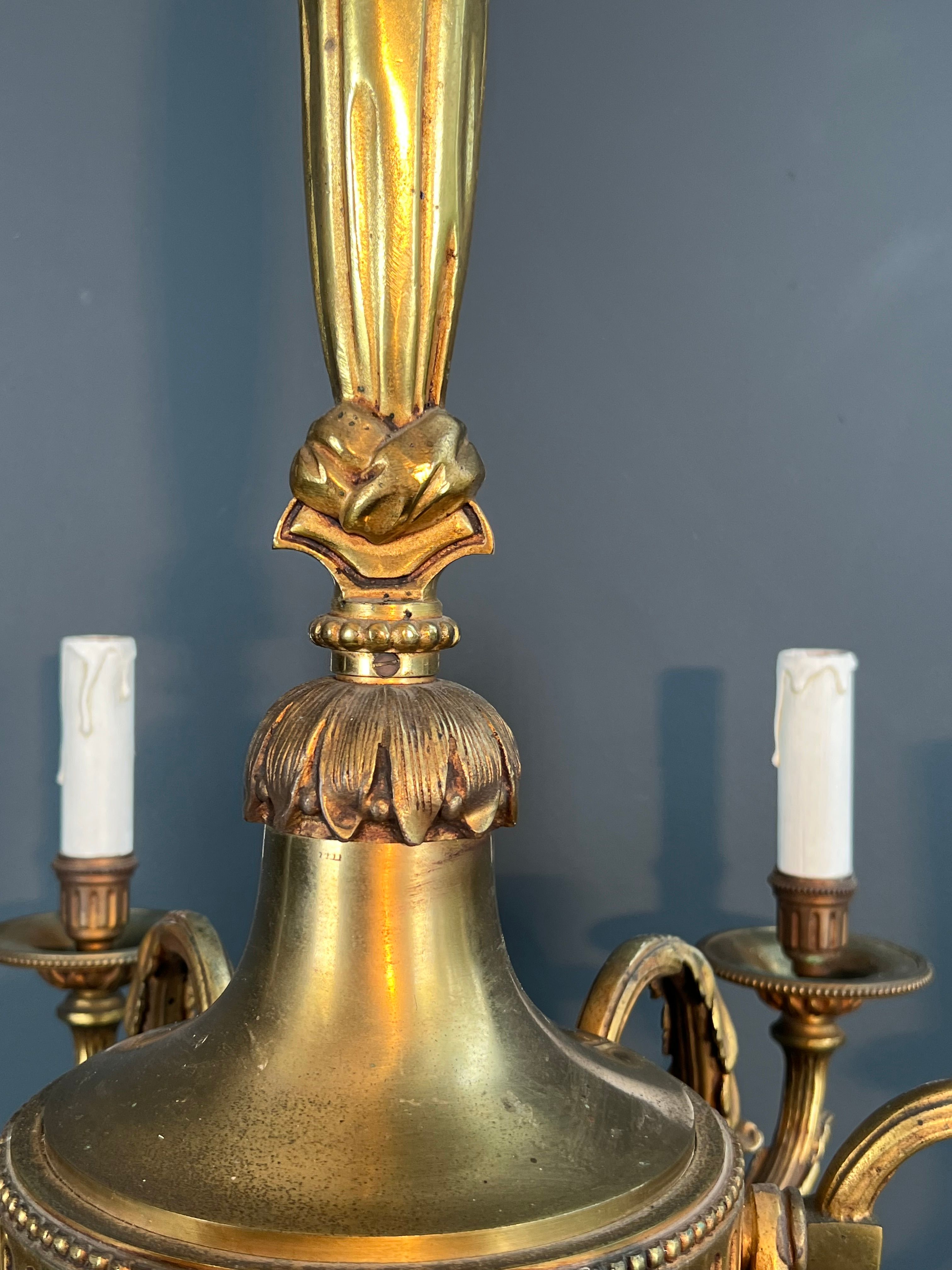 Bronze chandelier in Louis XVI style with 6 arms.