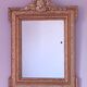 Napoleon III mirror with rich gilded ornamentation
