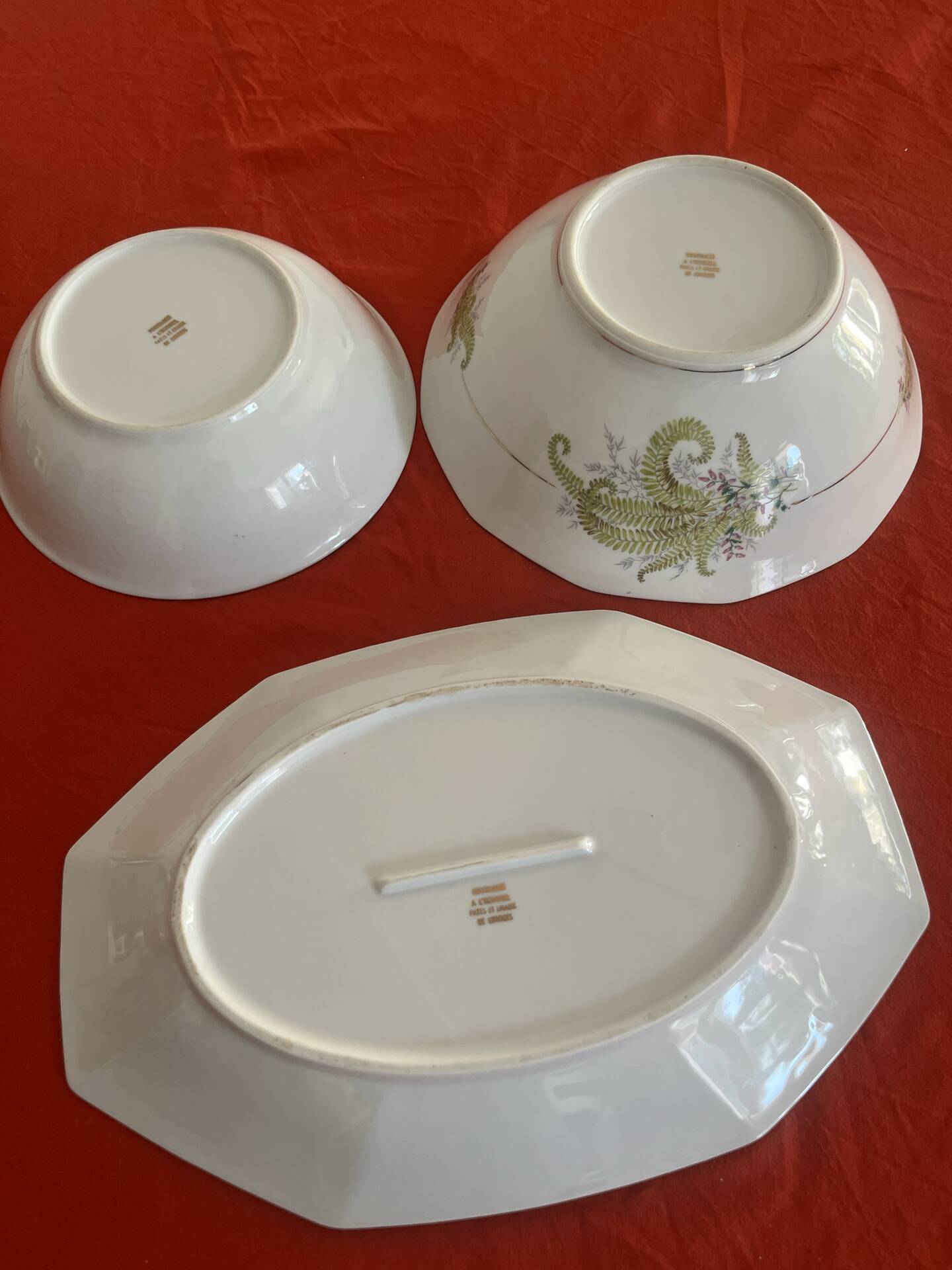 3 Limoges porcelain plates with a squirrel design.