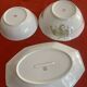 3 Limoges porcelain plates with a squirrel design.