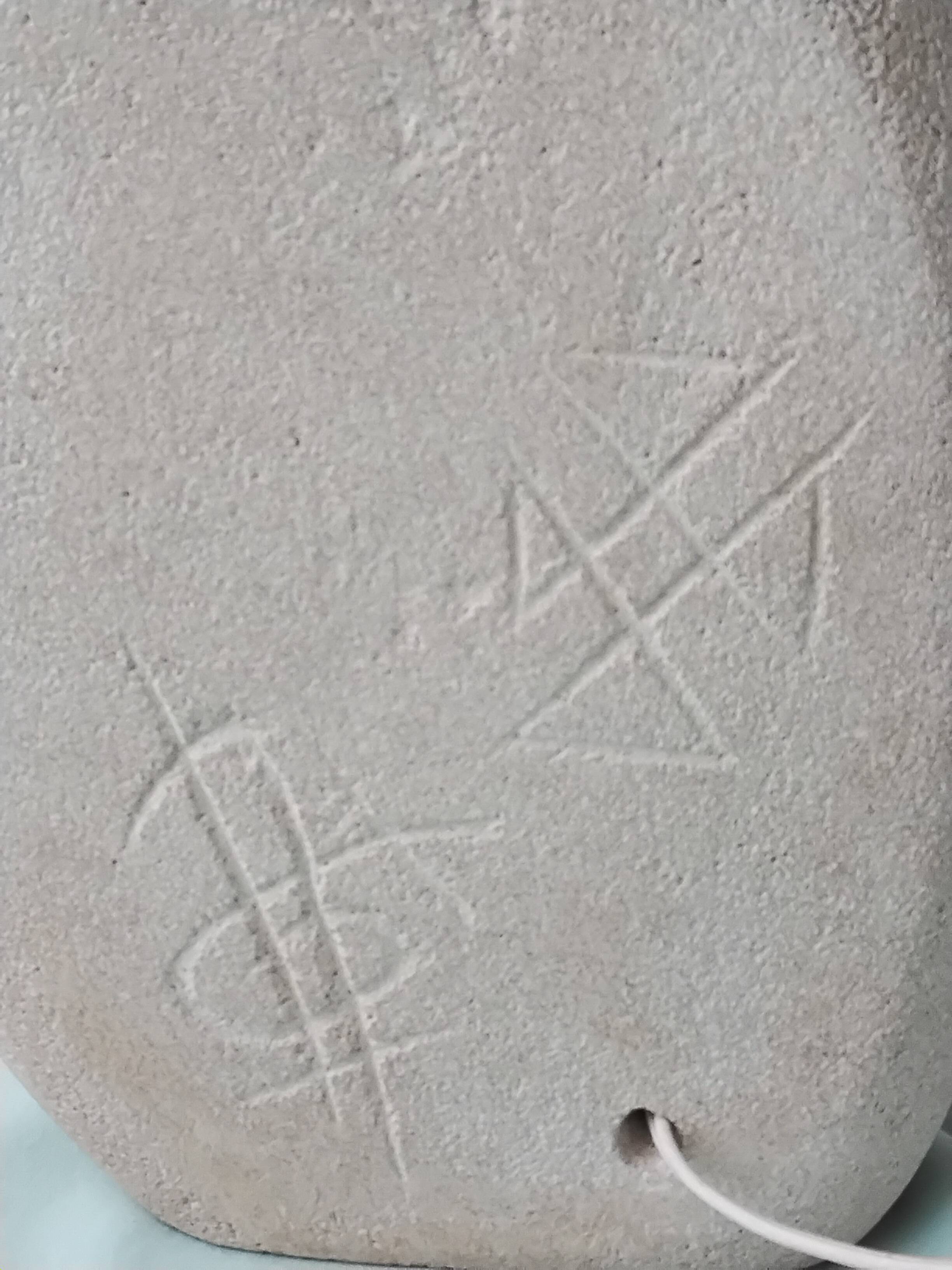 Sculpted stone lamp by Arsène Galisson