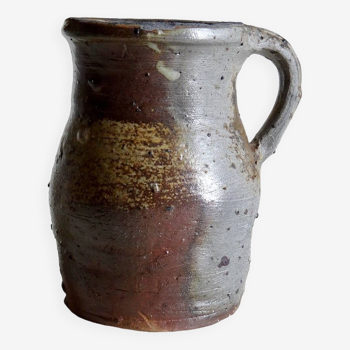 Old artisanal shaded stoneware pitcher