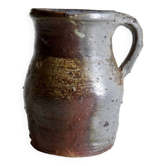 Old artisanal shaded stoneware pitcher