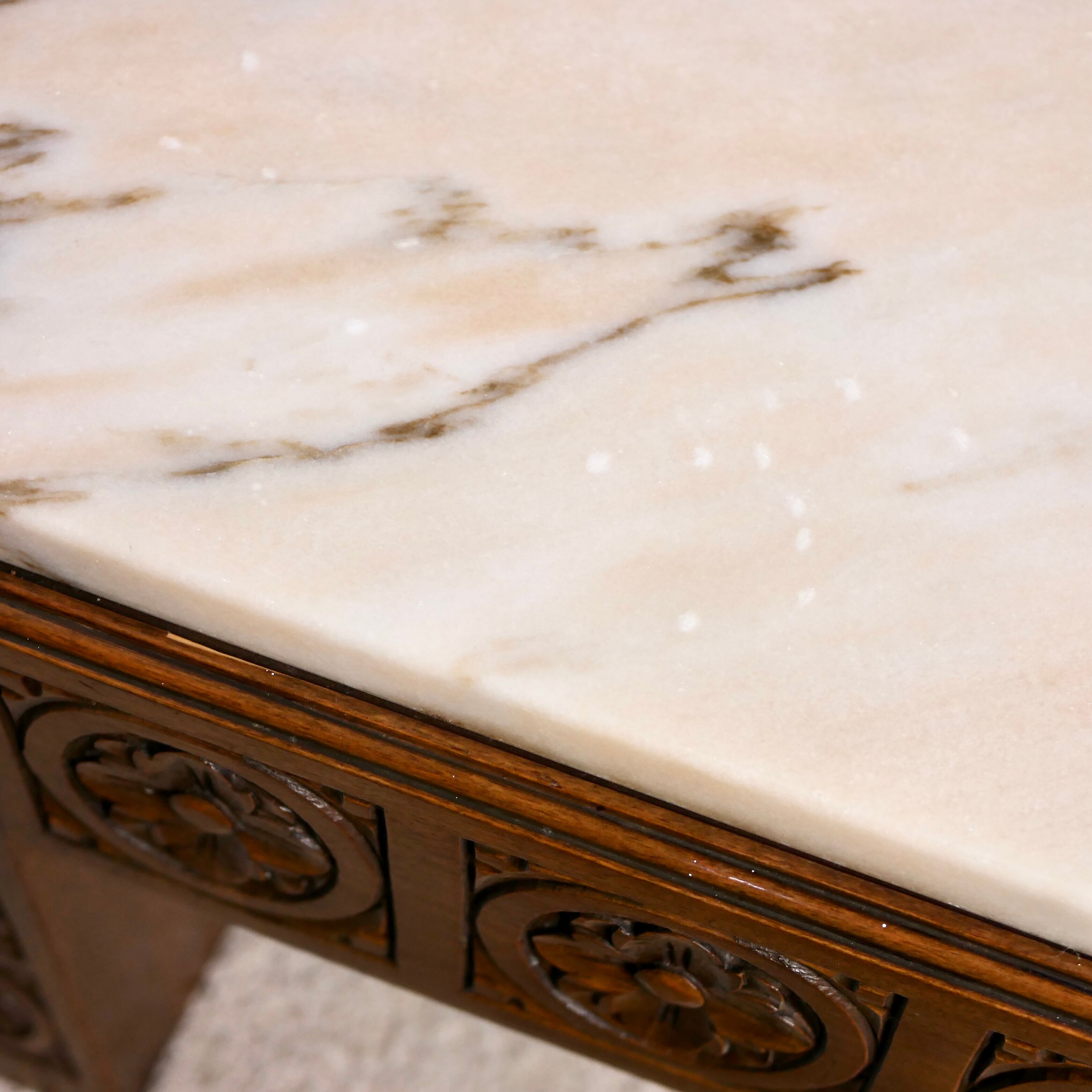 Table basse bois sculpté et marbre
