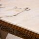 Table basse bois sculpté et marbre